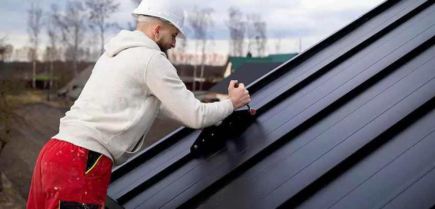 Tin Roof Ridge Cap Installation in New Rochelle
